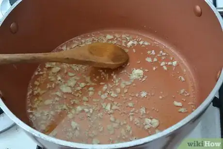 Image titled Cook Arroz Caldo Step 1