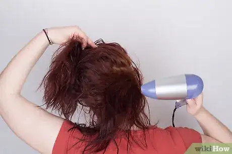 Image titled Curl Hair Using a Hot Air Brush Step 4