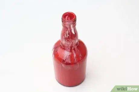 Image titled Turn Empty Glass Bottles Into Vases Step 14