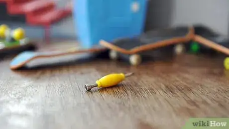 Image titled Tighten Your Wheels and Trucks on a Tech Deck Step 1