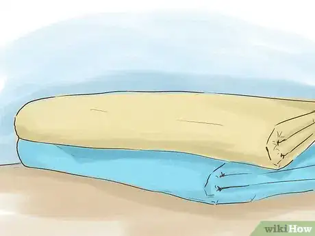 Image titled Deal with Someone Hogging the Sheets Step 4