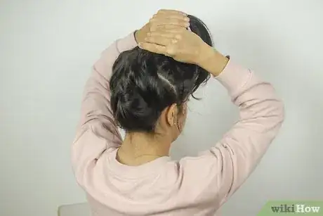 Image titled Do a Reverse Braided Bun Step 6