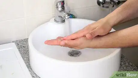 Image titled Put in Earplugs Step 1