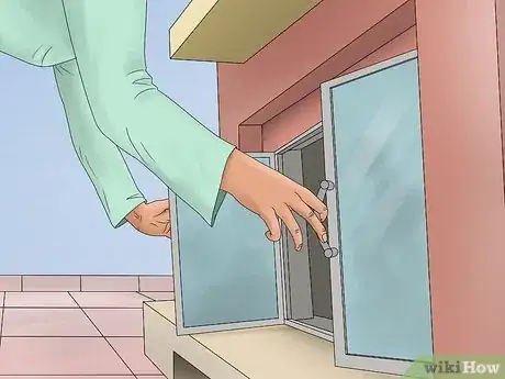 Image titled Clean Fireplace Glass Step 2