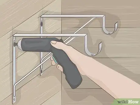 Image titled Hang Weed Eaters Step 5