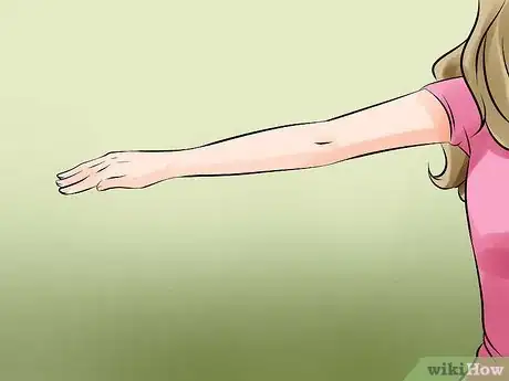 Image titled Lick Your Elbow Step 2