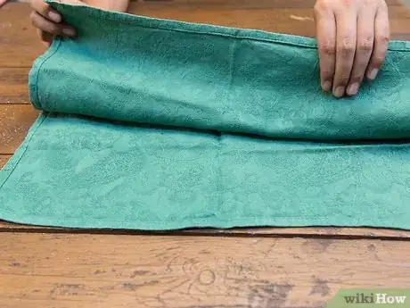 Image titled Fold a Napkin Like a Boat Step 2