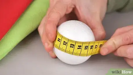 Image titled Make an Elegant No‐Sew Fabric Ball Christmas Ornament Step 1
