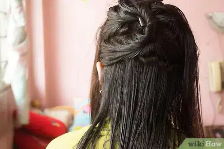 Image titled Straighten Hair with a Roller Brush Step 5