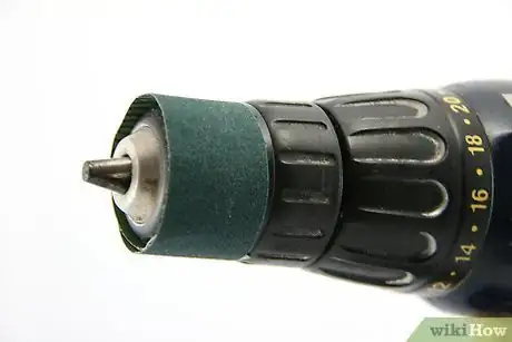 Image titled Sharpen a Knife With a Powerdrill and Sandpaper Step 3