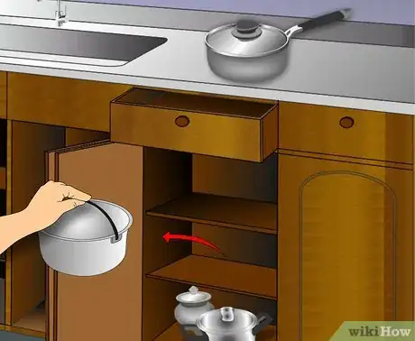 Image titled Clean Kitchen Cabinets Step 1
