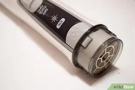 Image titled Straighten Hair with a Roller Brush Step 6