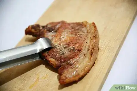 Image titled Tell if Pork Chops Are Done Step 3