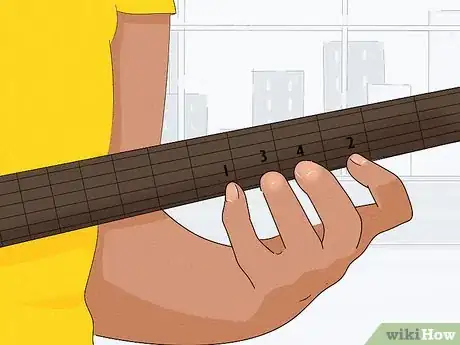 Image titled Keep Your Fingers Close to the Fretboard Step 2