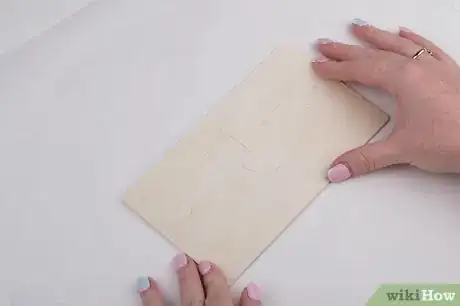 Image titled Glue a Puzzle Step 8