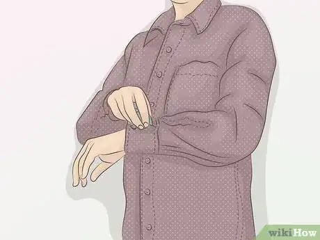 Image titled Roll Up Shirt Sleeves Step 1