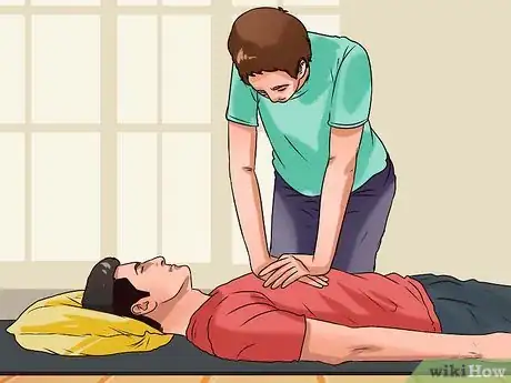 Image titled Respond to a Heart Attack Step 9