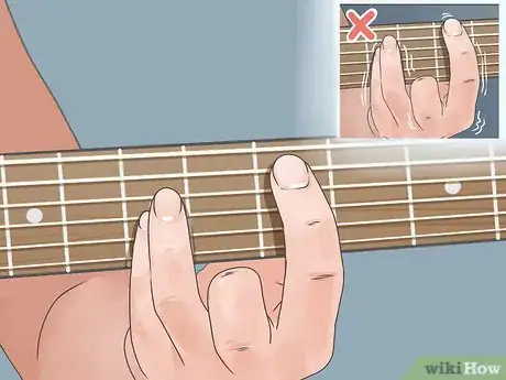 Image titled Extend the Life of Guitar Strings Step 2
