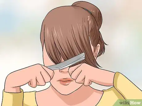 Image titled Cut Side Swept Bangs Step 11