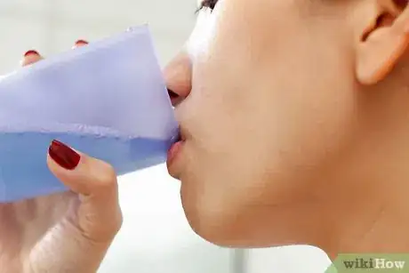 Image titled Have White Clean Shiny Teeth Step 11