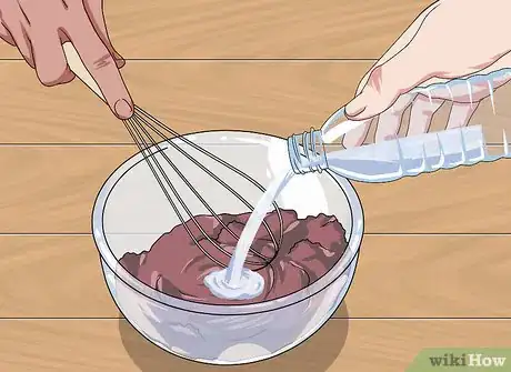 Image titled Bake a Cake Inside a Hollowed Orange over a Campfire Step 6