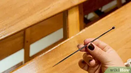 Image titled Hang Icicle Lights on a Railing Step 6