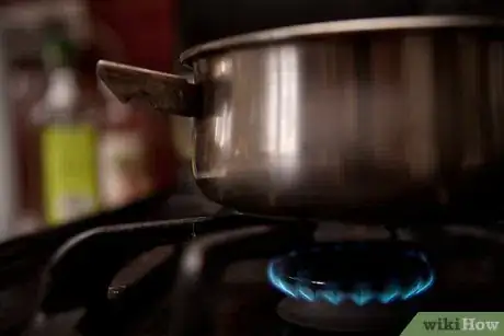 Image titled Stop Skin Forming on Milk Step 2