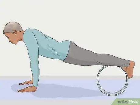 Image titled Use a Yoga Wheel Step 7
