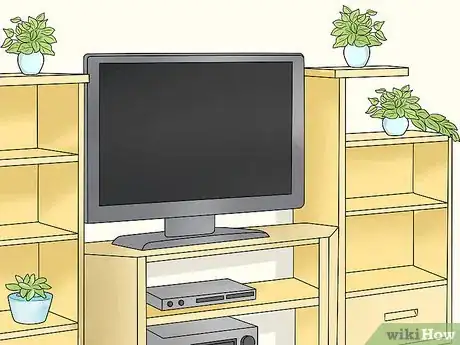 Image titled Decorate Entertainment Center Shelves Step 7