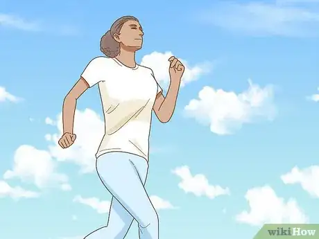 Image titled Move up Overhanging Rock Without Wasting Energy in Rock Climbing Step 1