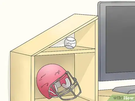 Image titled Decorate Entertainment Center Shelves Step 9