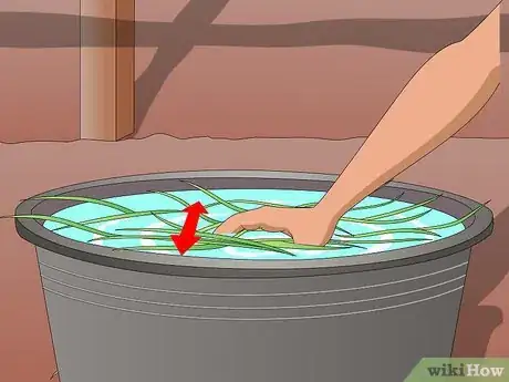 Image titled Use Water to Reduce Dust in Hay Step 2