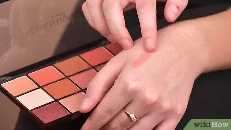 Image titled Wear Peach Eye Shadow Step 1