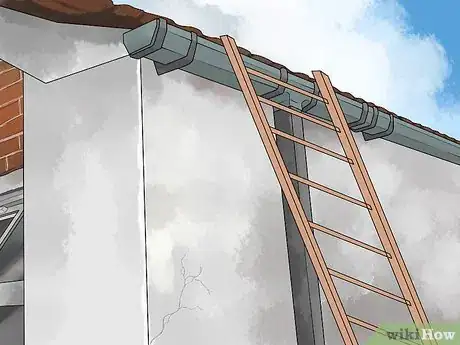Image titled Clean Aluminum Gutters Step 1