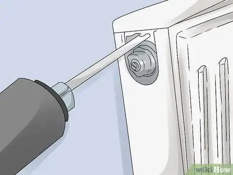 Image titled Clean Behind Radiators Step 12