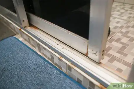 Image titled Remove Sliding Glass Shower Doors Step 5