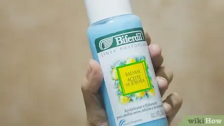 Image titled Style Poofy Hair Step 3