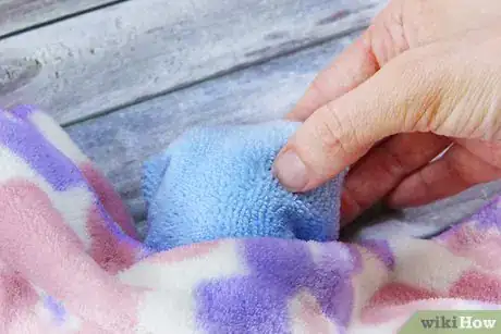 Image titled Fold Towel Butterflies Step 8