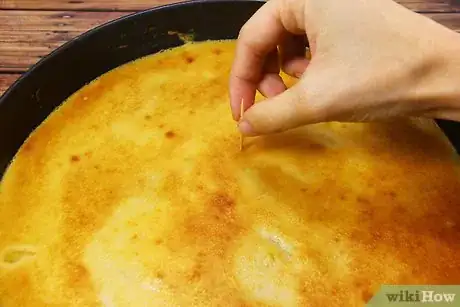 Image titled Bake a Ring Into a Cake or Other Food Step 7