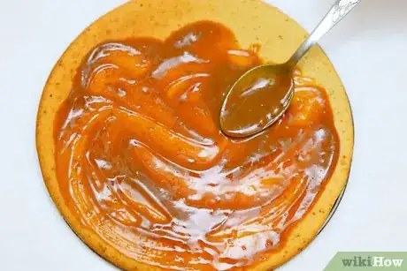 Image titled Make Chocolate Turtle Poke Cake Step 6