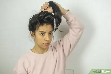 Image titled Do a Reverse Braided Bun Step 7