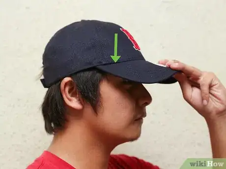 Image titled Break in a Baseball Cap Step 1