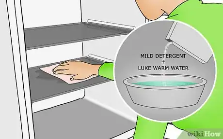 Image titled Cover Refrigerator Shelves in Plastic Wrap Step 2