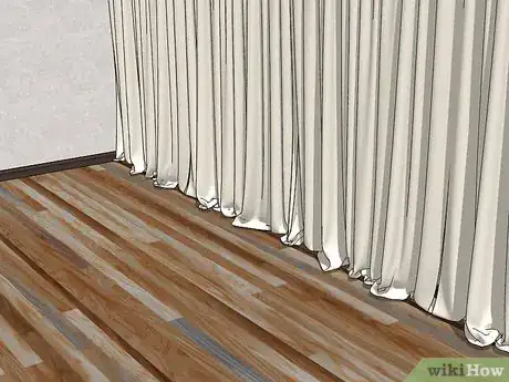 Image titled Decorate Living Room Walls Step 7