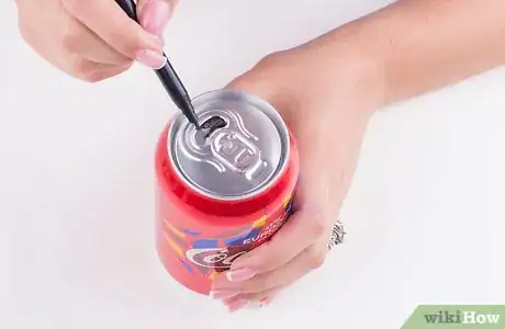 Image titled Do the Soda Can Magic Trick Step 1