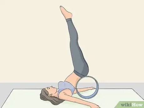 Image titled Use a Yoga Wheel Step 6