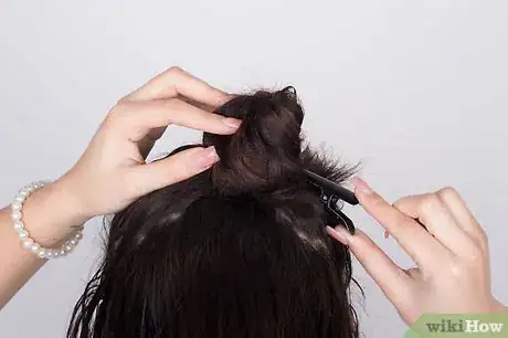 Image titled Get Shiny Hair While Using a Flat Iron Step 9