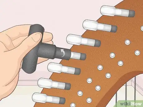 Image titled Change a Harp String Step 1