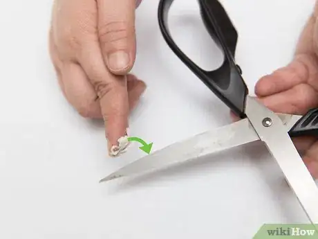 Image titled Clean Adhesive from Scissors Step 2