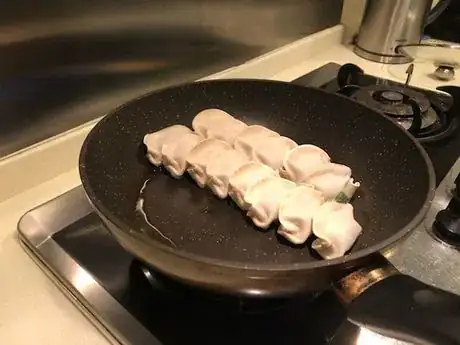 Image titled Puttingthedumplings.jpeg